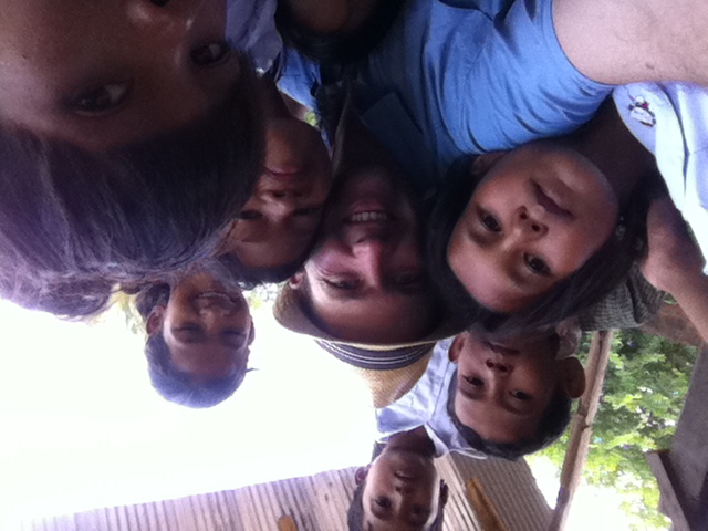 Jon Cobler with children in Cambodia in 2011